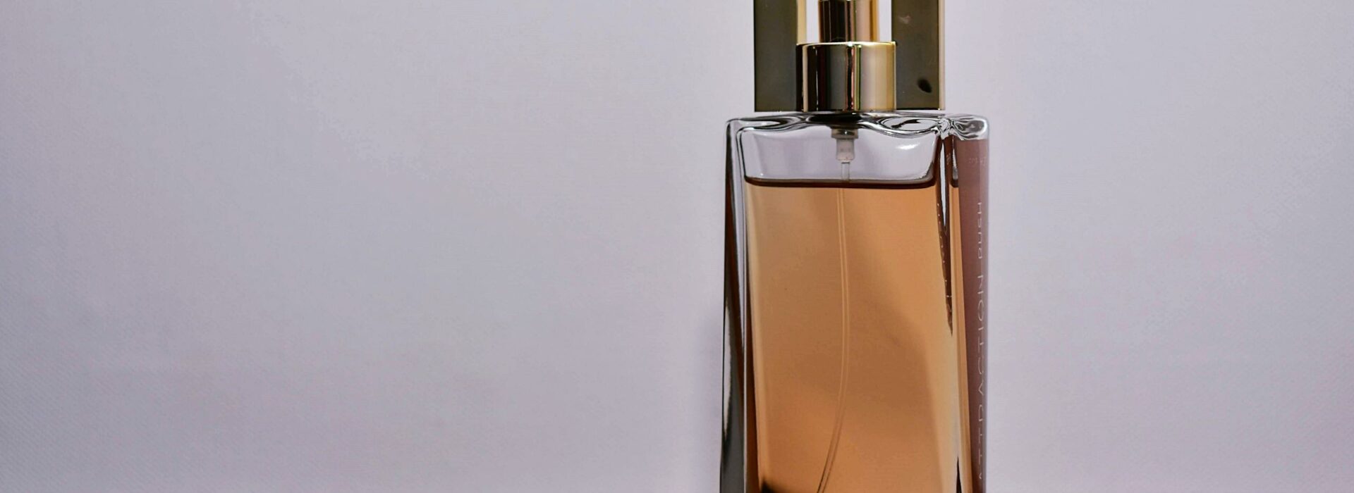 Close-Up Photo of Perfume Bottle